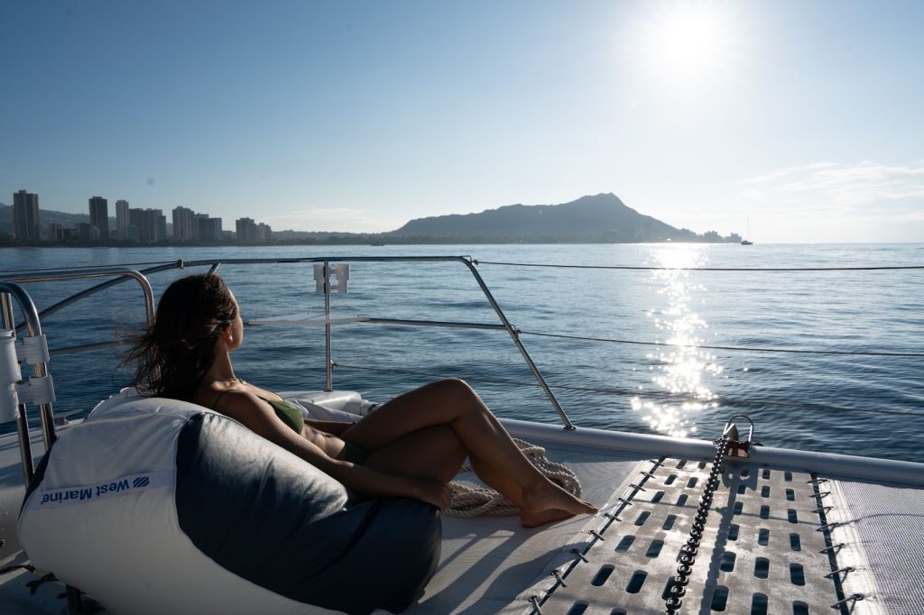 A guest enjoying calm waters on a Hawaiian cruise.