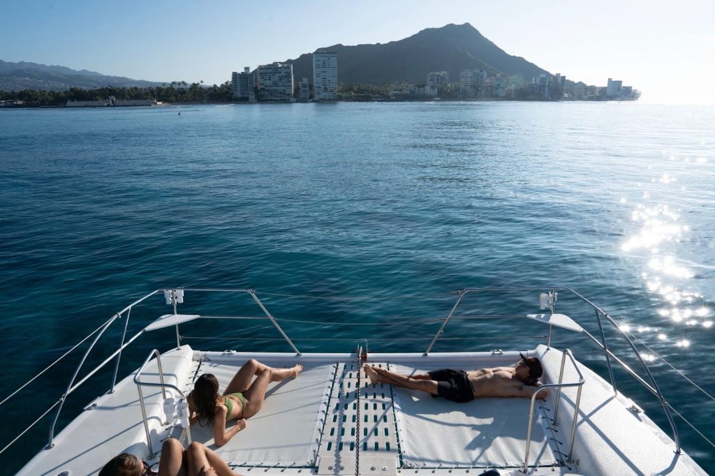 Guests relaxing on a cruise in Hawaii. 