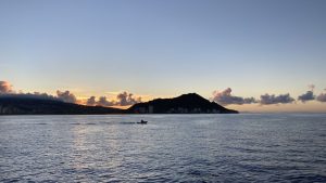A moment captured just before sunrise from a boat in Oahu.