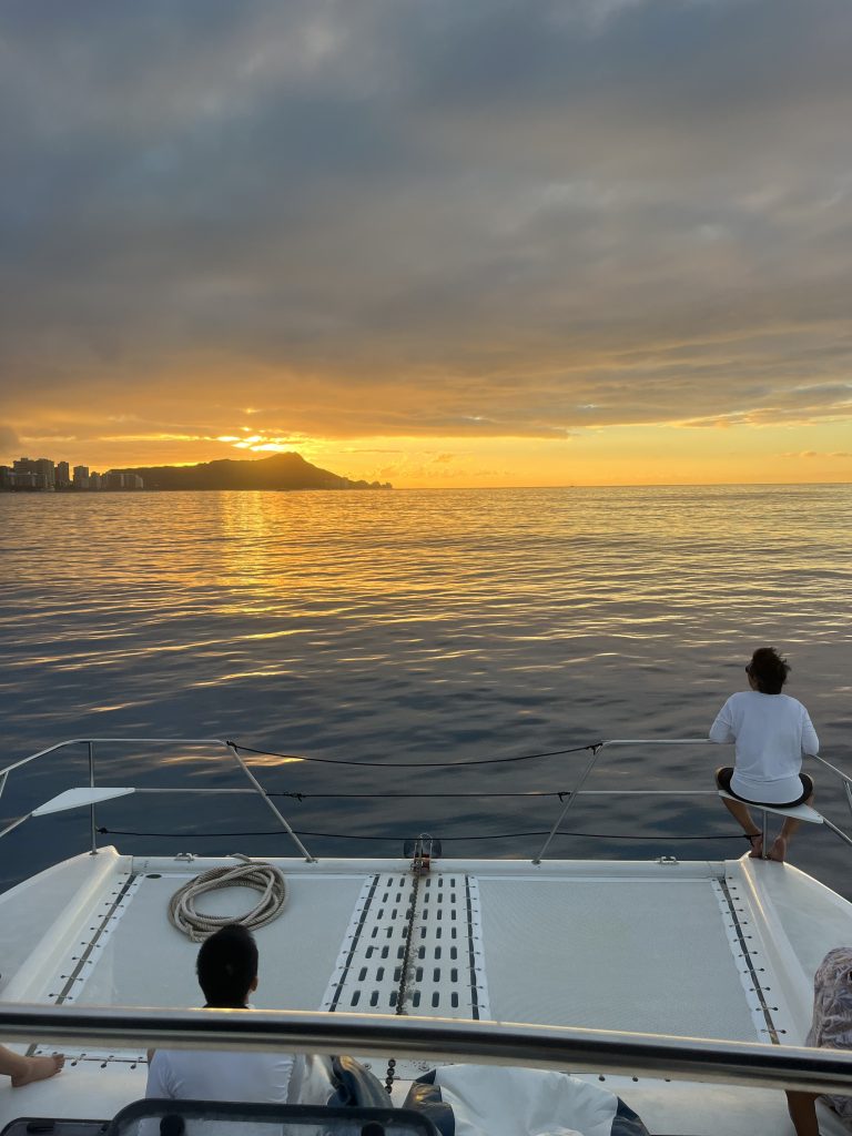 Sunset over Diamond Head from a catamaran