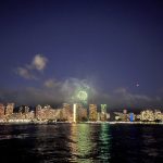 Fireworks display over Waikiki skyline from water
