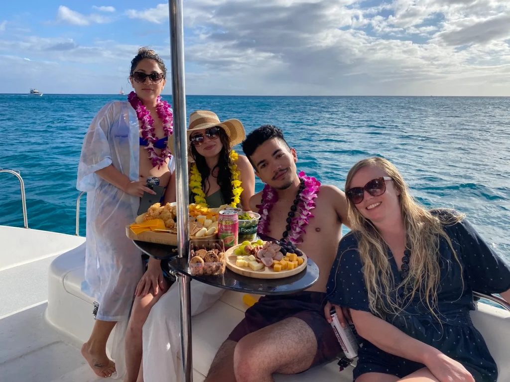 Boat tour off the Waikiki coast offering ocean views and sightseeing experiences in Oahu.