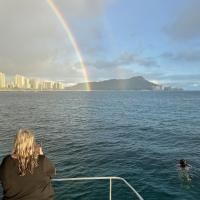 a rainbow over a body of water